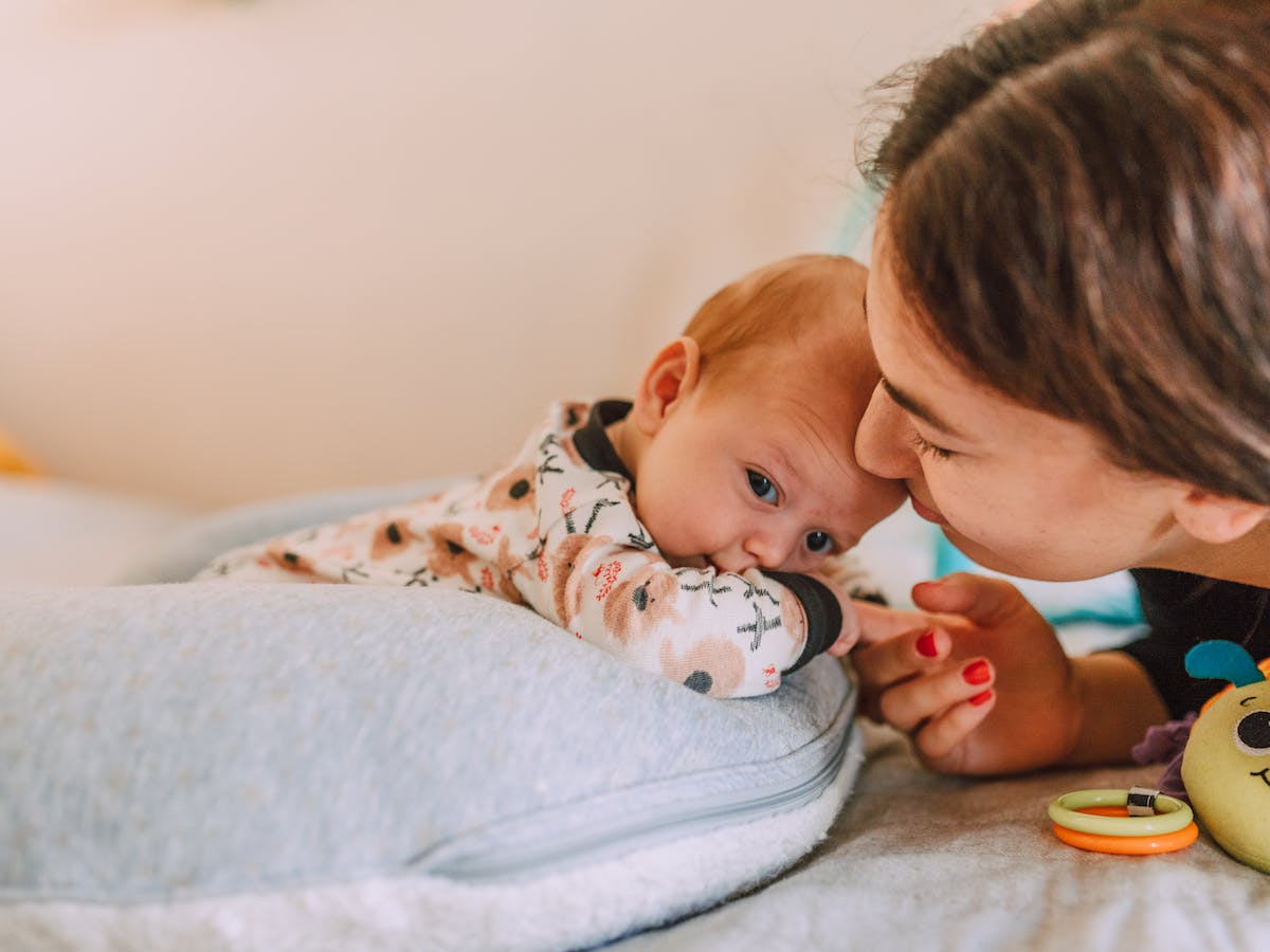 Mom at home with her baby.